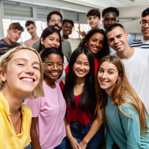 diverse-group-of-young-student-people-taking-selfi
