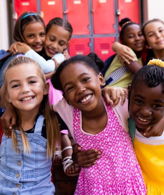 portrait-of-diverse-happy-schoolgirls