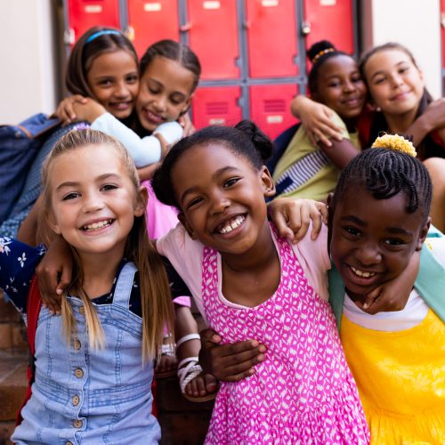 portrait-of-diverse-happy-schoolgirls