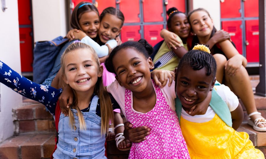 portrait-of-diverse-happy-schoolgirls